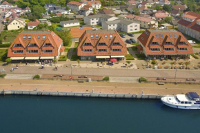 hafennahe Ferienwohnung mit Balkon und Meerblick - Hafenhäuser Wiek FeWo Wohnung 04, Wiek Auf Rügen 